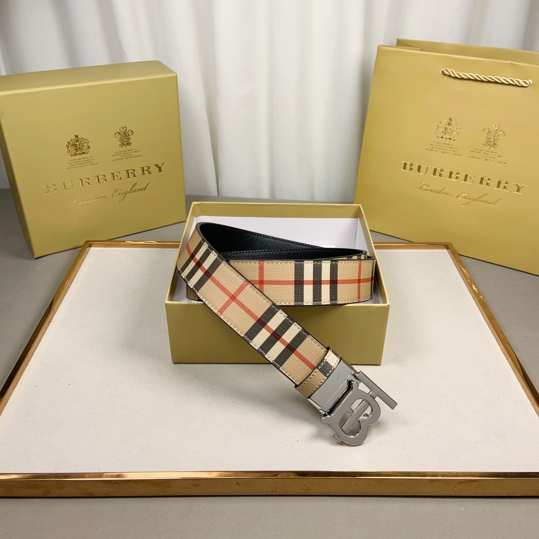 Burberry Reversible Check TB Belt in the Archive beige color with a silver-tone TB monogram plaque buckle.