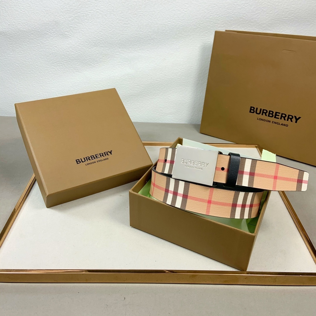 Burberry Vintage Check reversible belt with a logo plaque buckle.