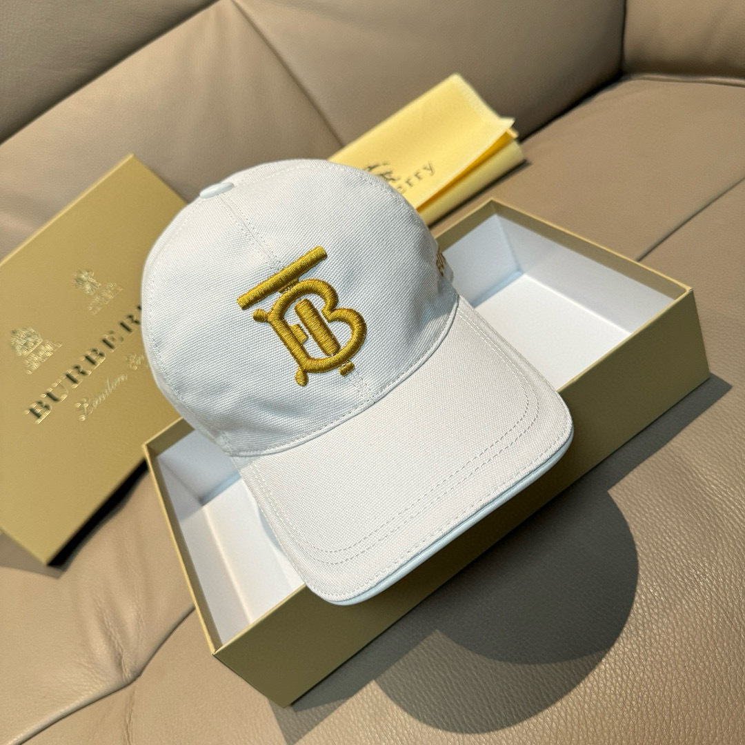 white cotton Burberry baseball cap with an embroidered Equestrian Knight Design and logo.