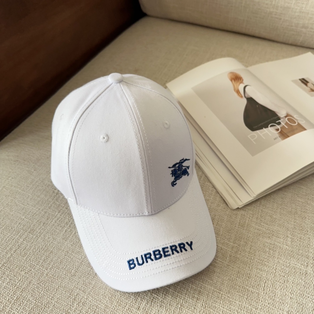Burberry cotton baseball cap with an embroidered logo and lettering.