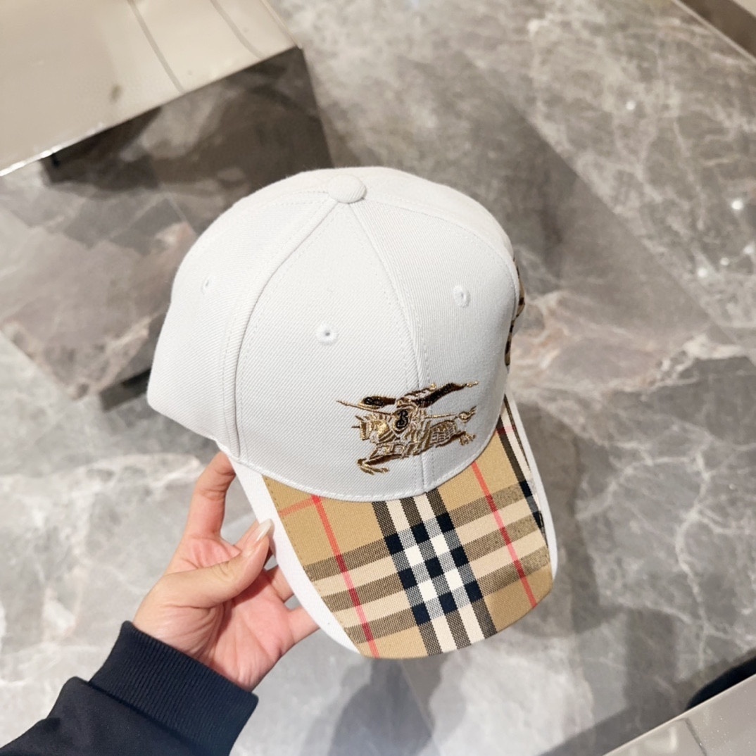 Burberry baseball cap featuring the Nova Check pattern on the brim and the Equestrian Knight logo embroidered on the front.