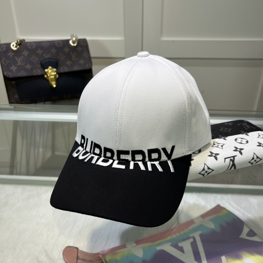 Burberry cotton canvas baseball cap in off-white and black featuring an appliquéd logo.