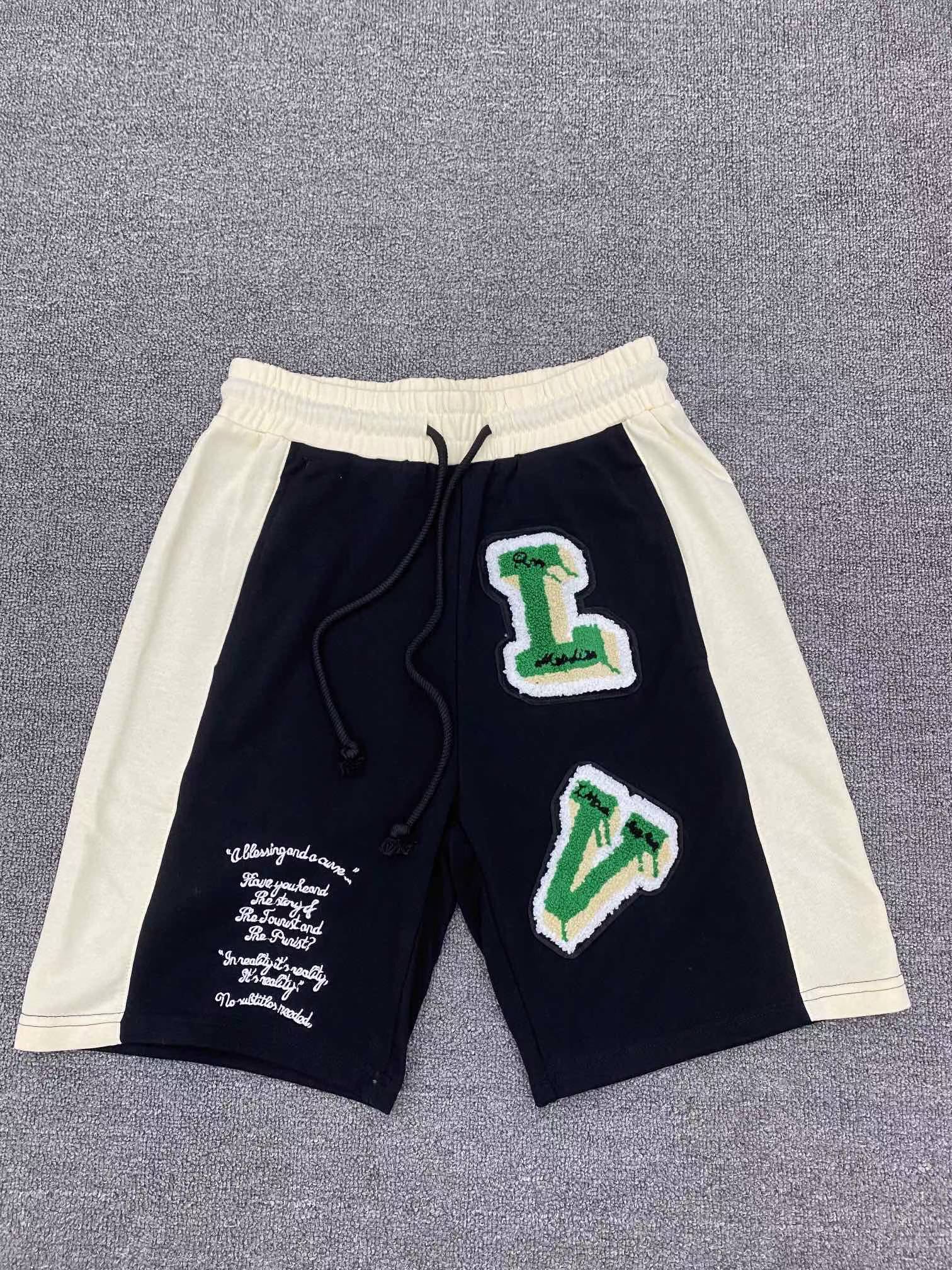 LV Carpenter Shorts in a black and beige color block design