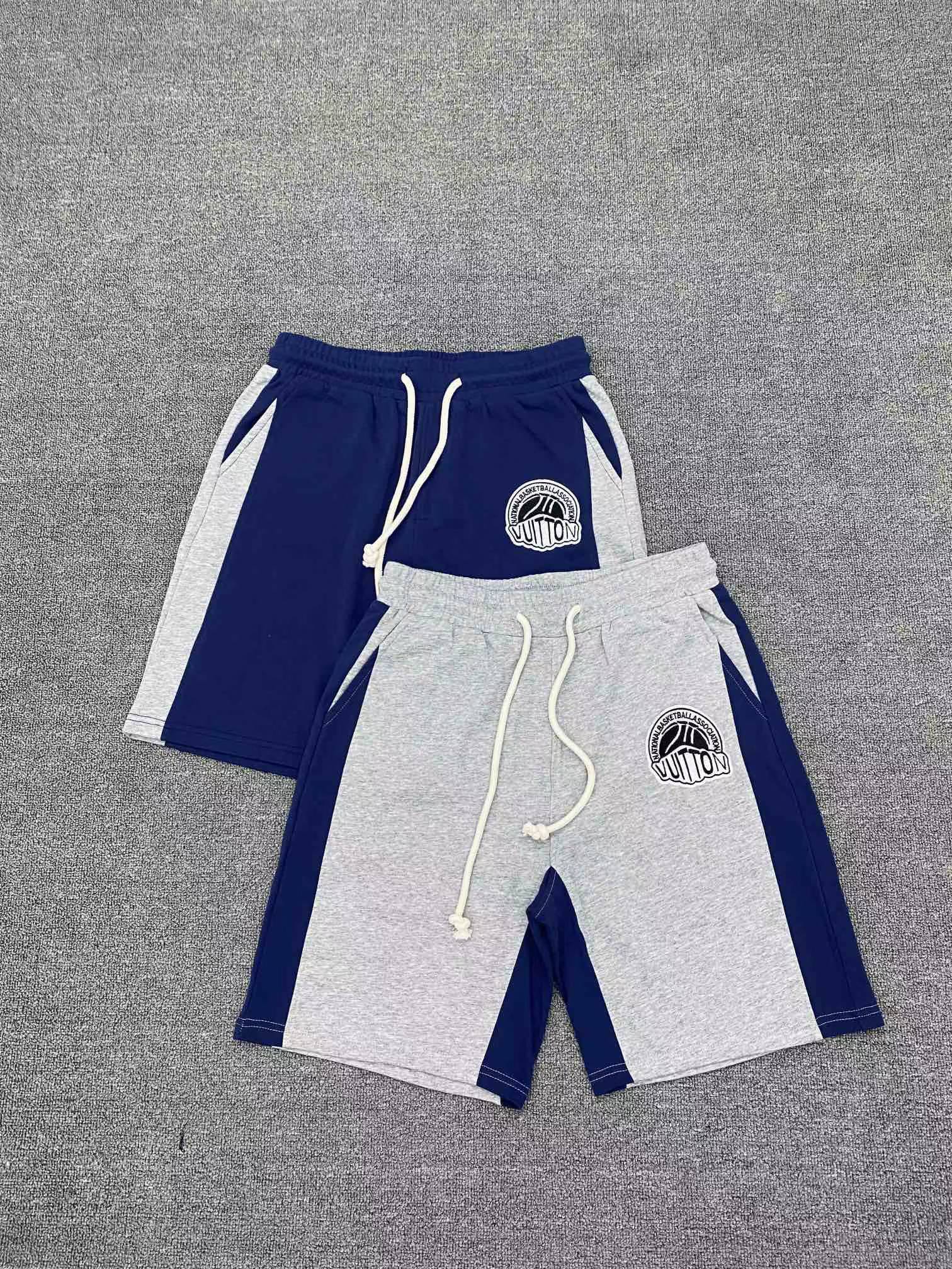 LV men's sweat shorts with contrast taping and a graphic logo