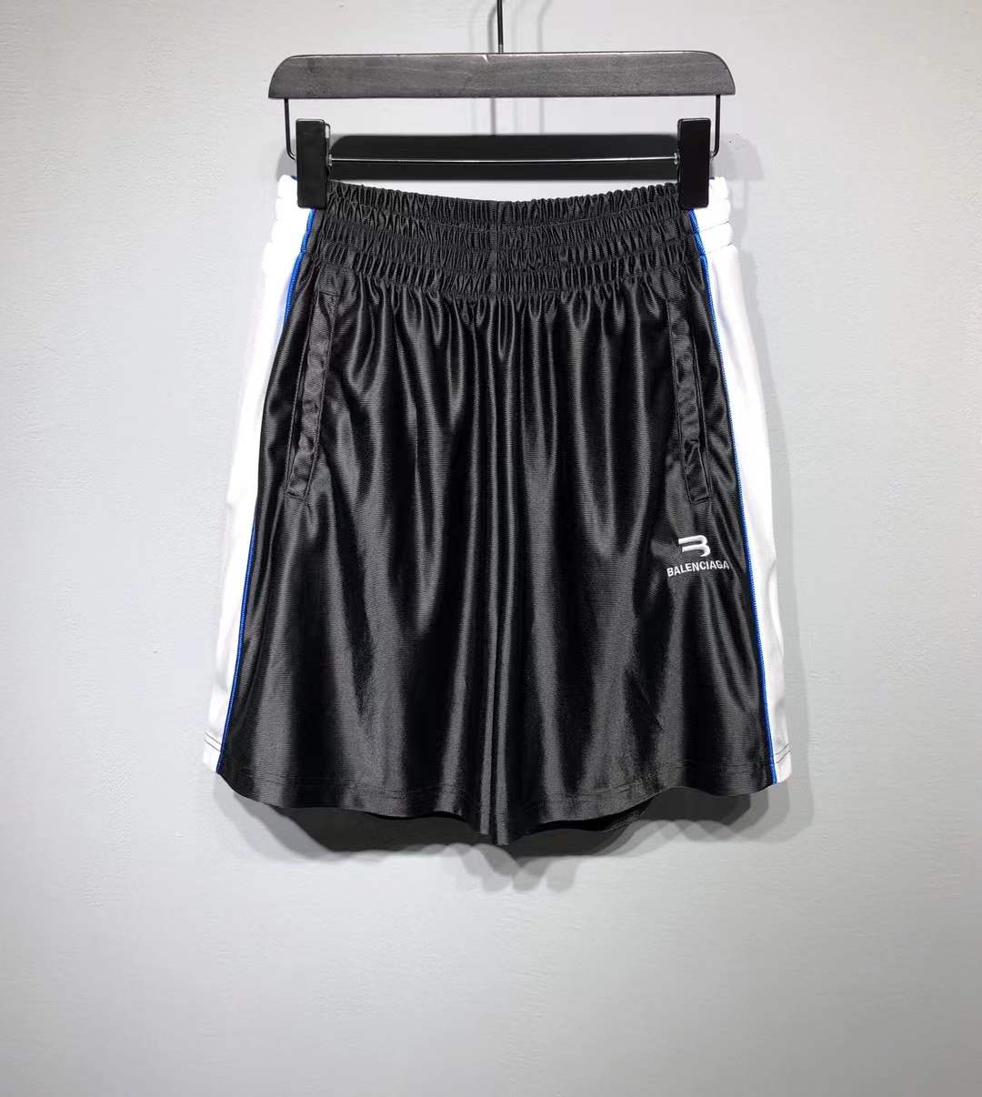 Balenciaga shorts in black with white and blue side panels