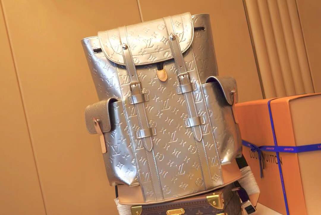 LV Christopher MM backpack in Monogram Mirror coated canvas with a silver-tone finish
