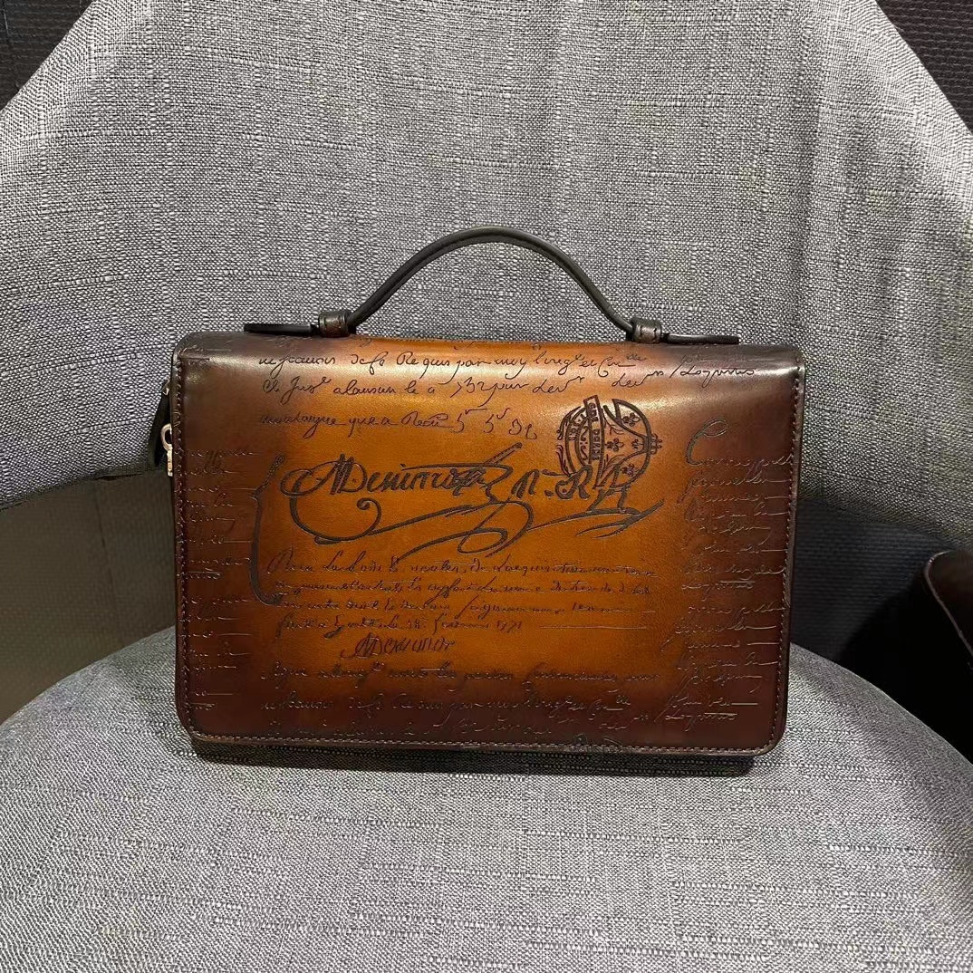 Berluti Un Jour Scritto leather long wallet or zipped pouch in a brown patina finish