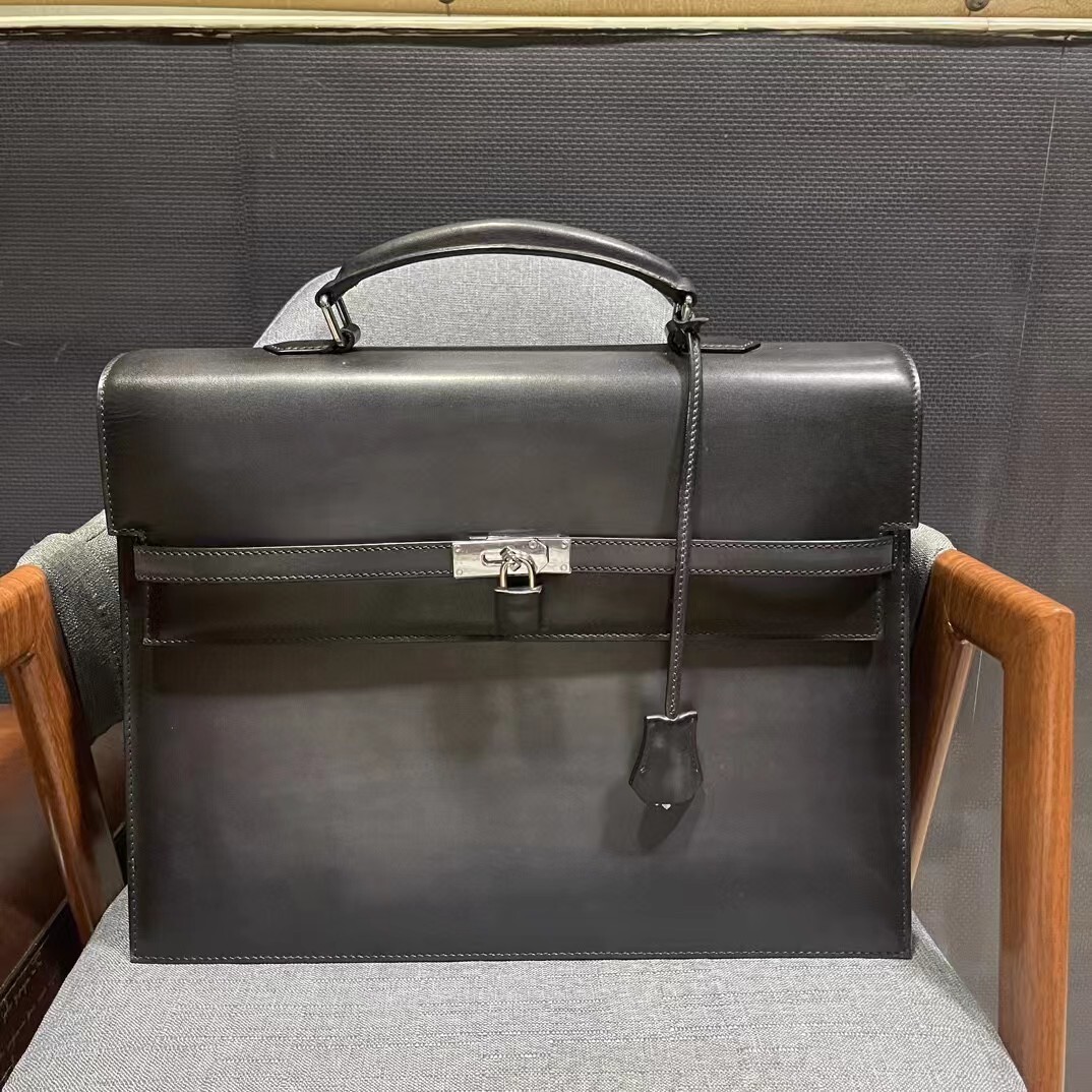 Hermès Kelly Depeche 38 men's briefcase in black leather with palladium hardware