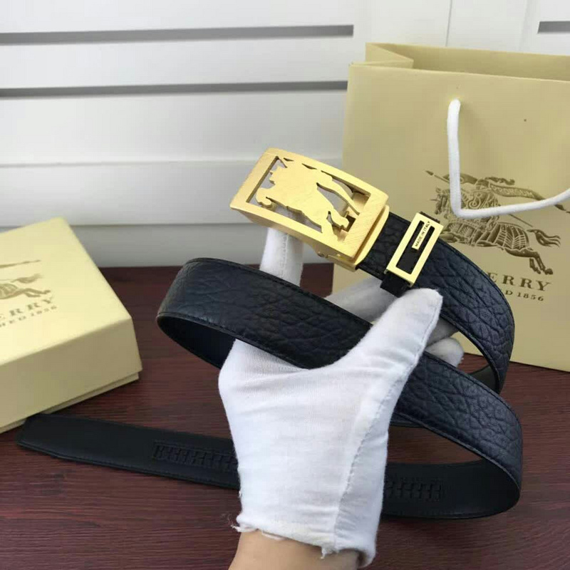 Burberry black leather belt with a gold-tone buckle featuring a logo design.