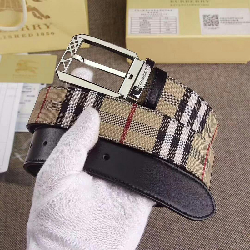 Burberry reversible belt featuring the signature beige House check pattern in a coated canvas and black leather