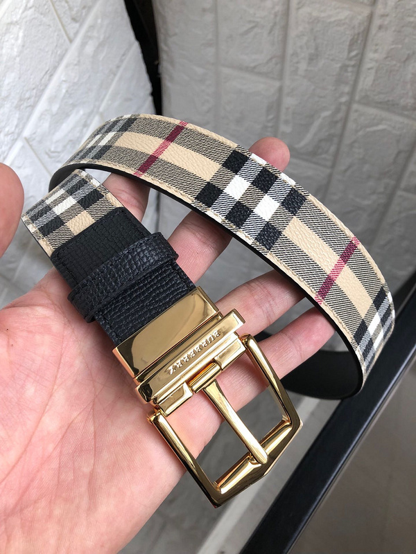 Burberry reversible check and leather belt with a gold-tone buckle