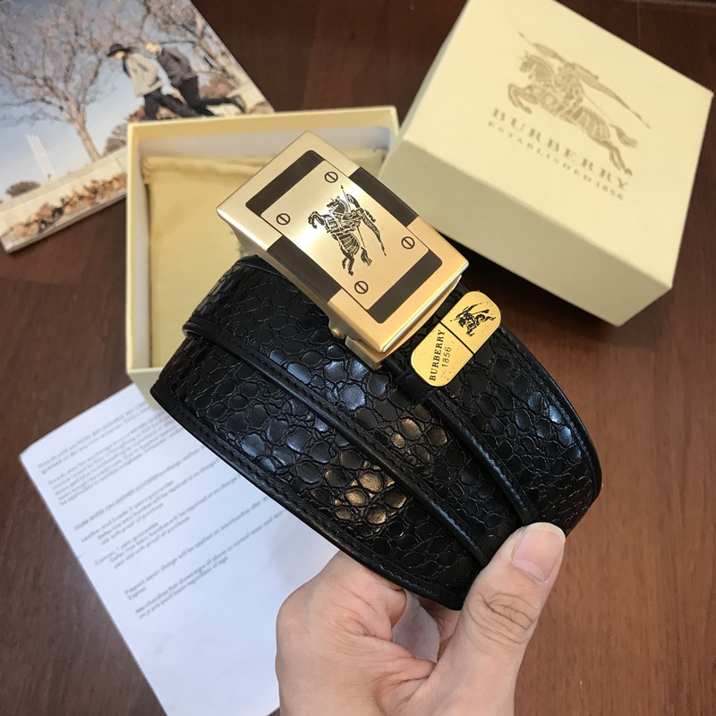 Burberry black leather belt with a gold-tone knight logo buckle