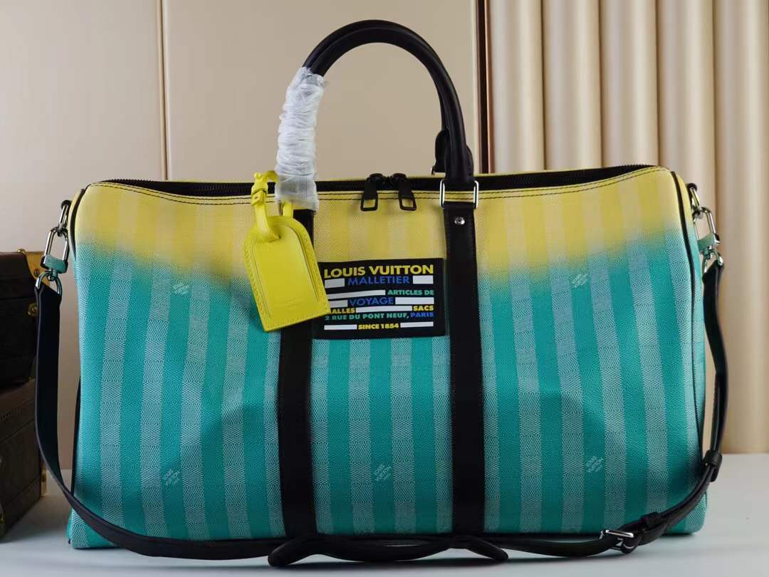 LV Keepall 50 Bandouliere travel bag in a Damier Stripes Gradient Green coated canvas.