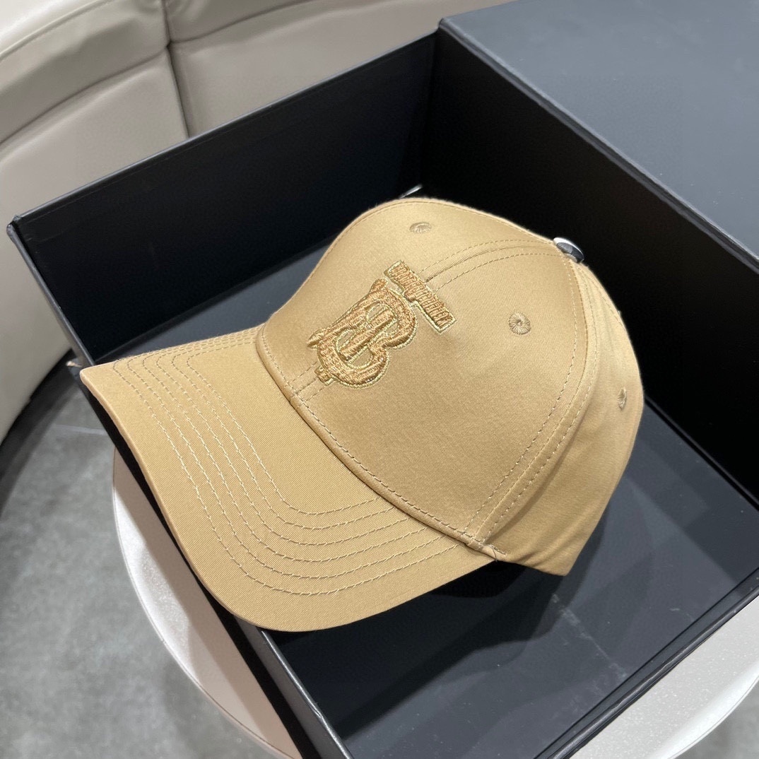 Burberry Logo Gabardine Baseball Cap in a flax or honey color.