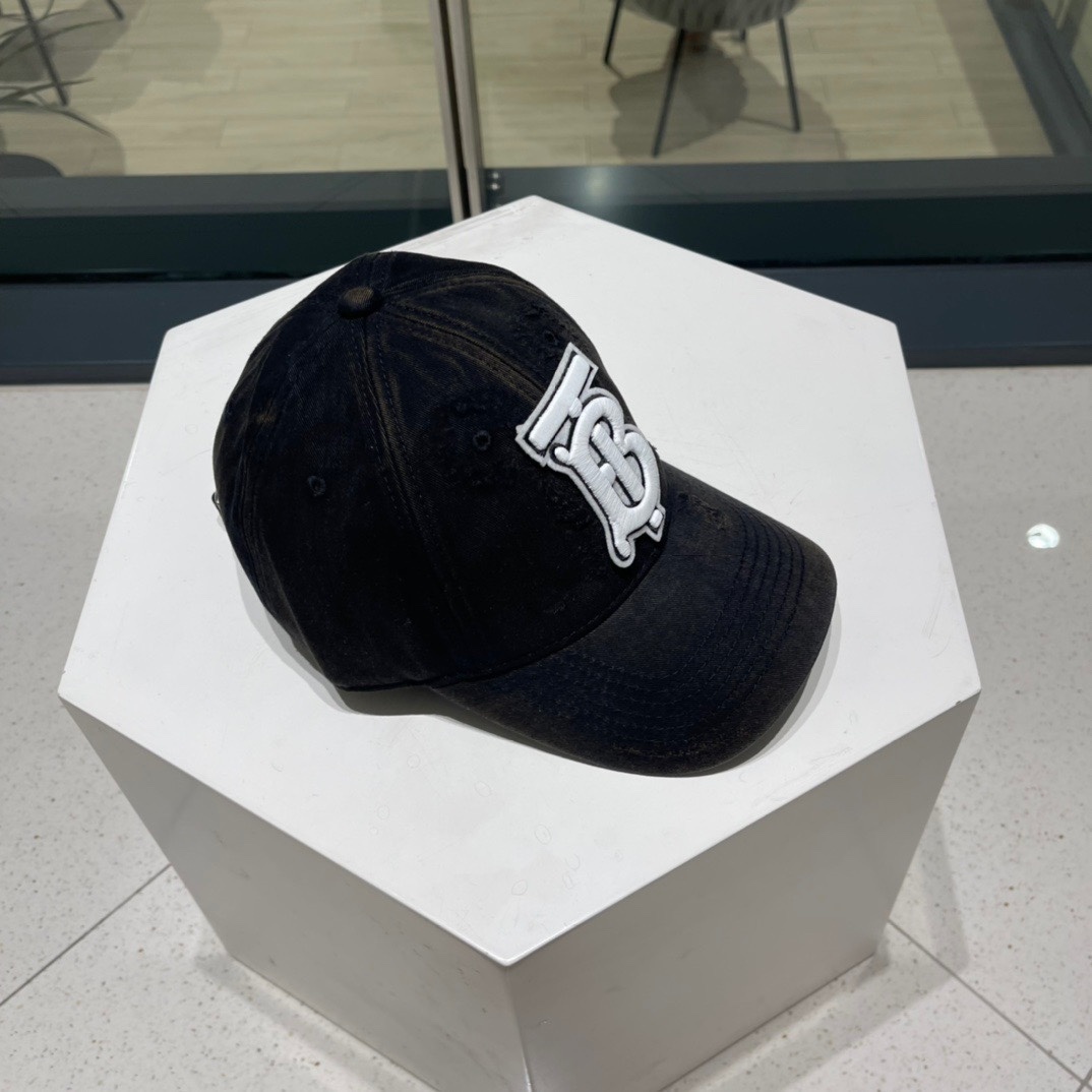 Burberry cotton baseball cap with an embroidered white Thomas Burberry "TB" monogram logo