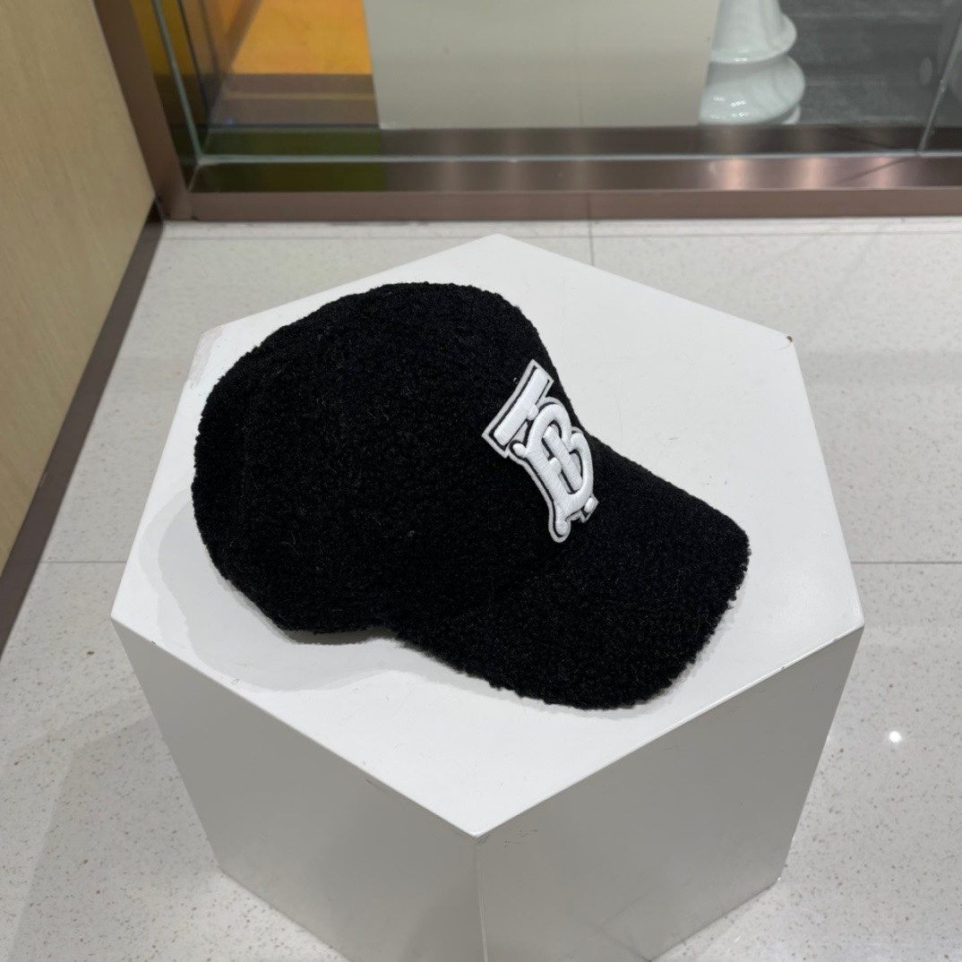 Burberry baseball cap Black with a white embroidered Monogram motif, made from cotton terry material.