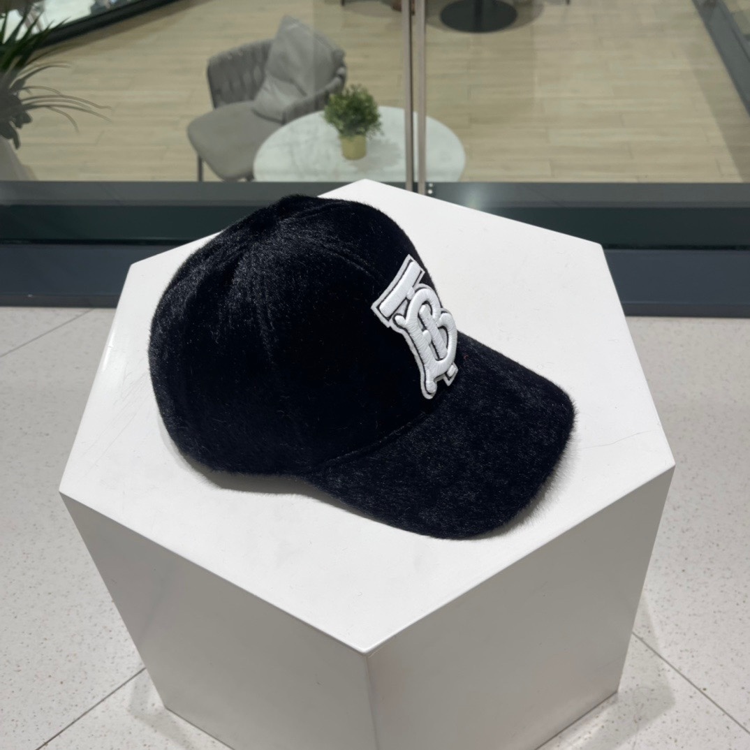 Burberry baseball cap black with an embroidered "TB" (Thomas Burberry) monogram logo.