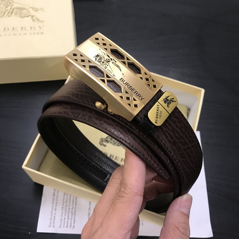Burberry brown leather belt with a gold-tone Equestrian Knight Design buckle.