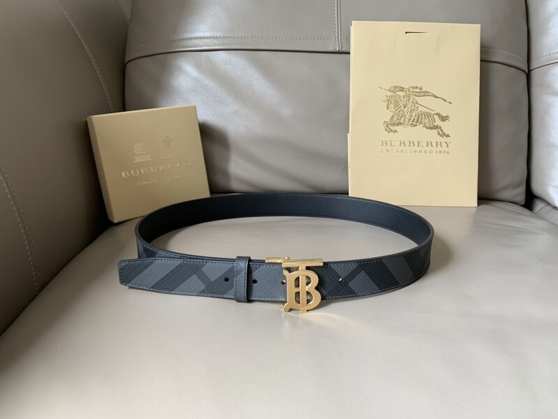 Burberry Reversible Check TB belt with a gold-tone B buckle, featuring a black and charcoal grey check pattern.