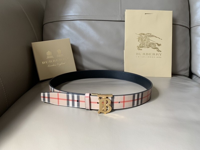 Burberry Reversible Check TB Belt in archive beige with a gold-plated Thomas Burberry Monogram plaque buckle.