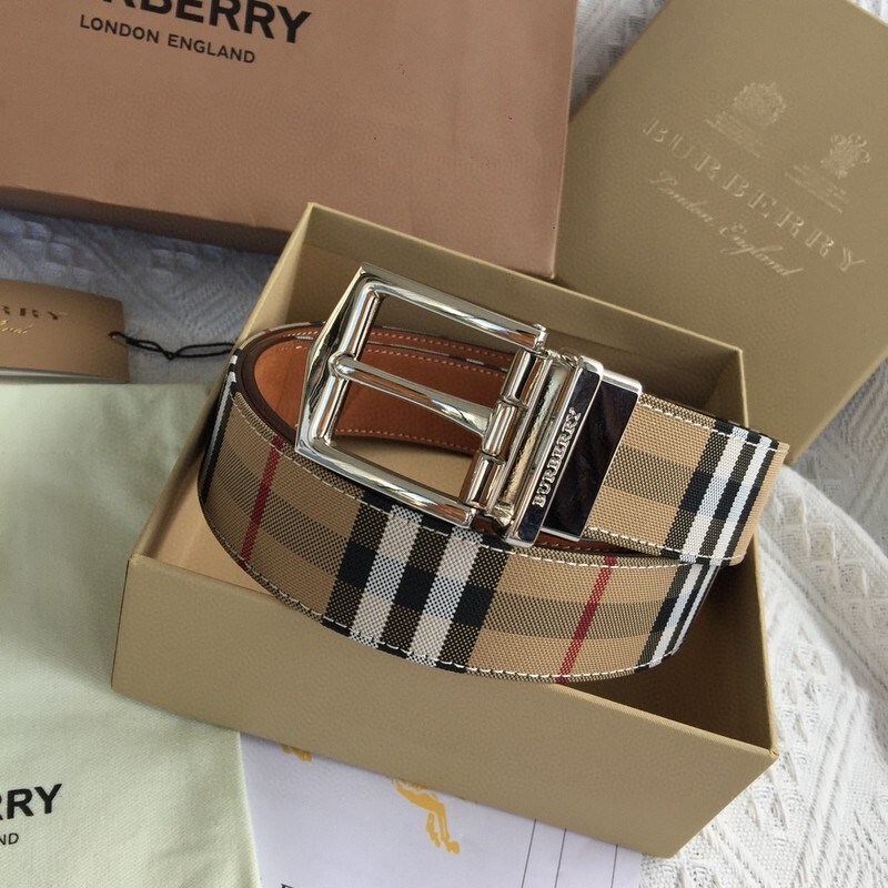 Burberry Reversible Check Pin Belt in archive beige and black leather, featuring a palladium-plated metal pin buckle engraved with the brand logo.
