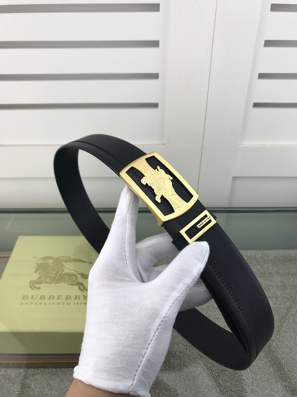 Burberry belt black with a gold-tone knight logo buckle.
