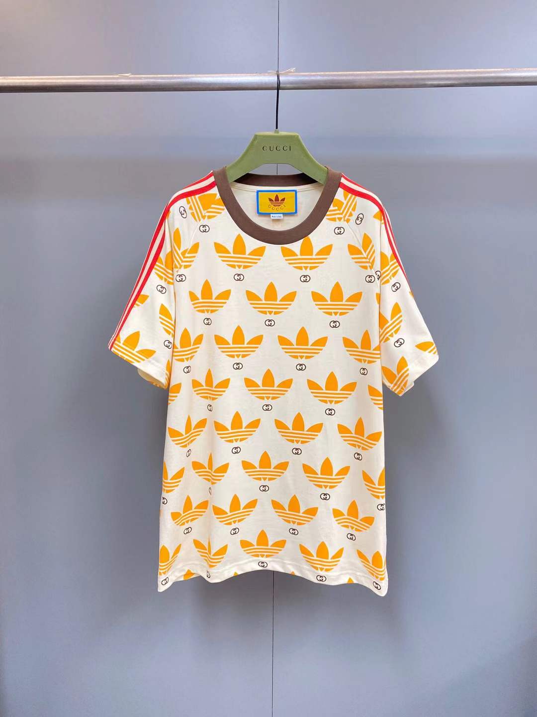 Gucci x Adidas cotton jersey T-shirt with a Trefoil logo all-over print from their 2022-23 collaboration