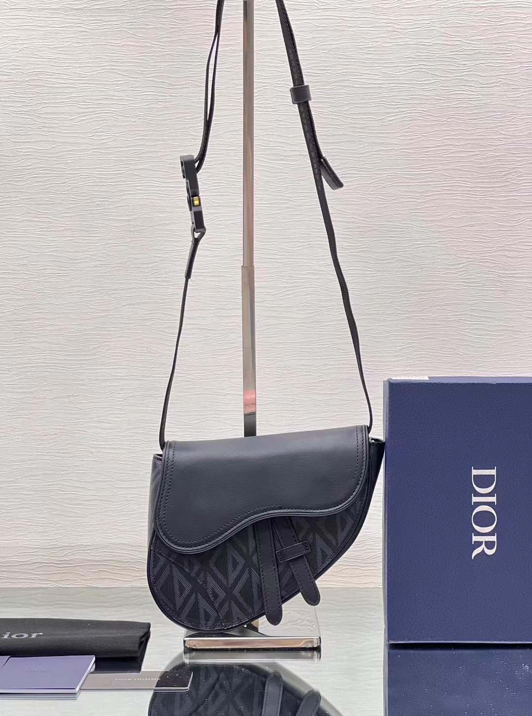 Dior Saddle bag in black Dior Oblique jacquard and black grained calfskin.
