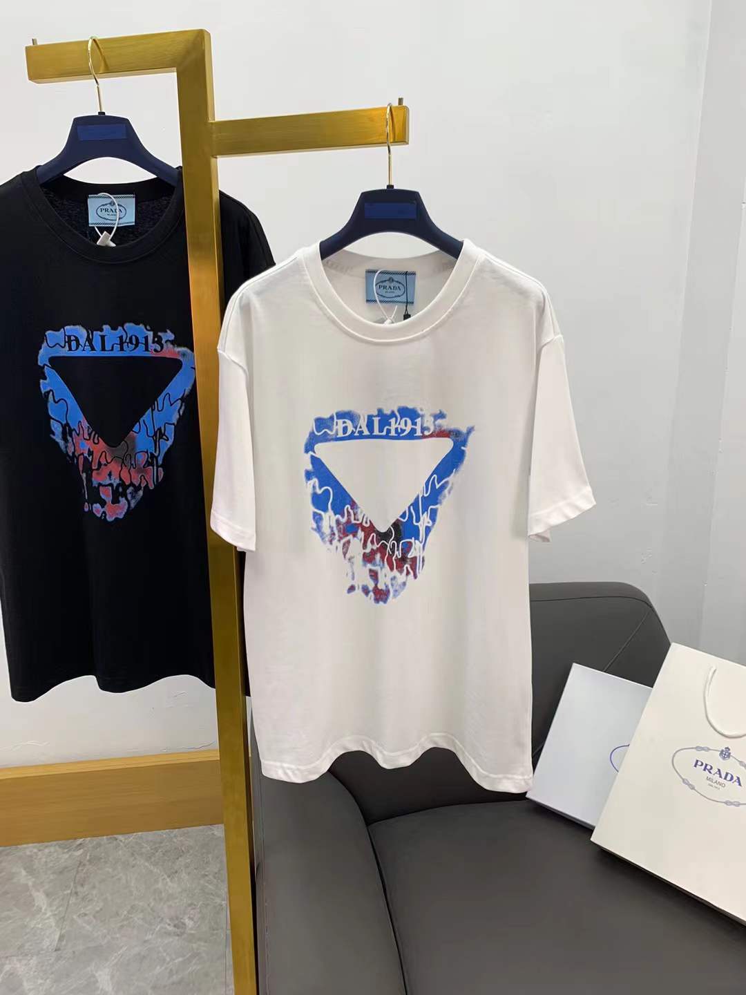 Prada cotton T-shirt white distressed logo print.