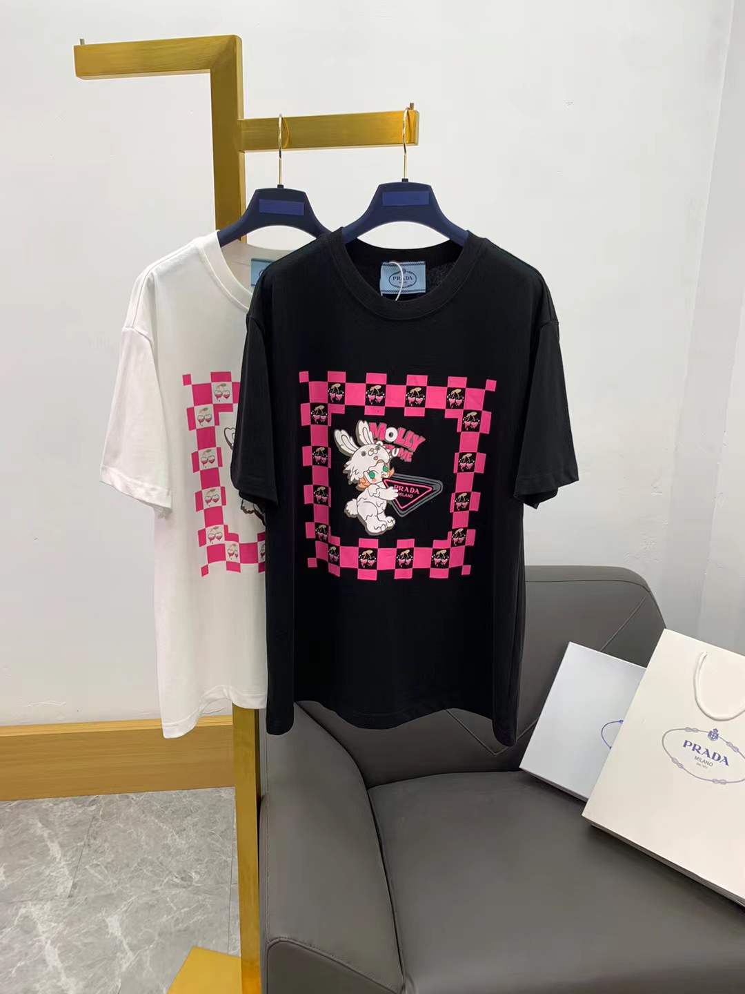 prada black cotton graphic-print T-shirt featuring a rabbit motif.