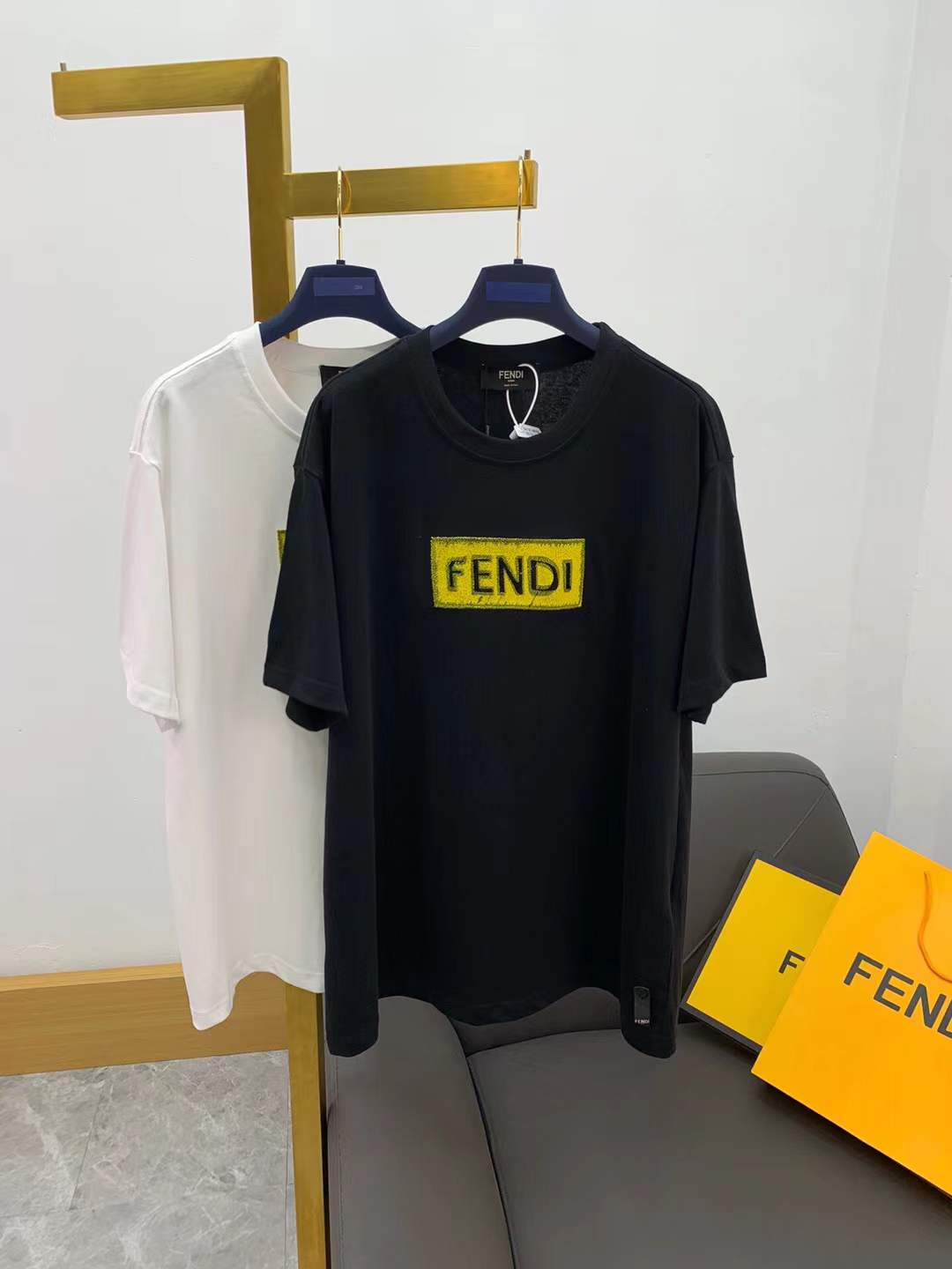 Fendi cotton T-shirt black with a yellow logo.