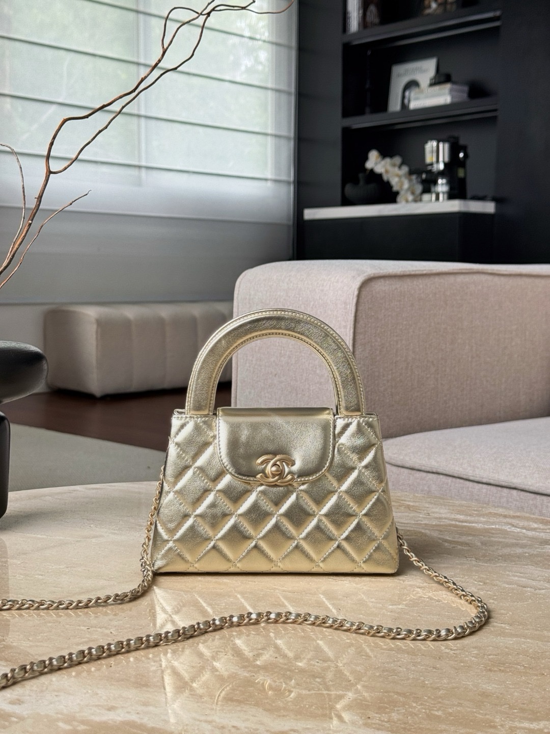 Chanel Metallic Shiny Aged Calfskin Quilted Nano Kelly Shopper bag in gold Size 13x19x7cm