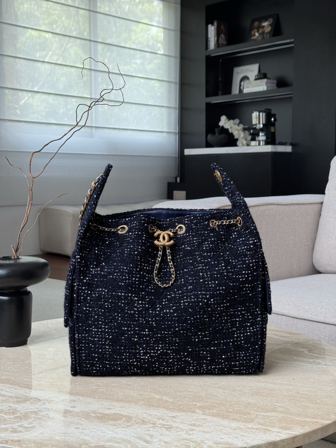 Chanel 25 bag in sparkly blue tweed material. Size 30x40x15cm