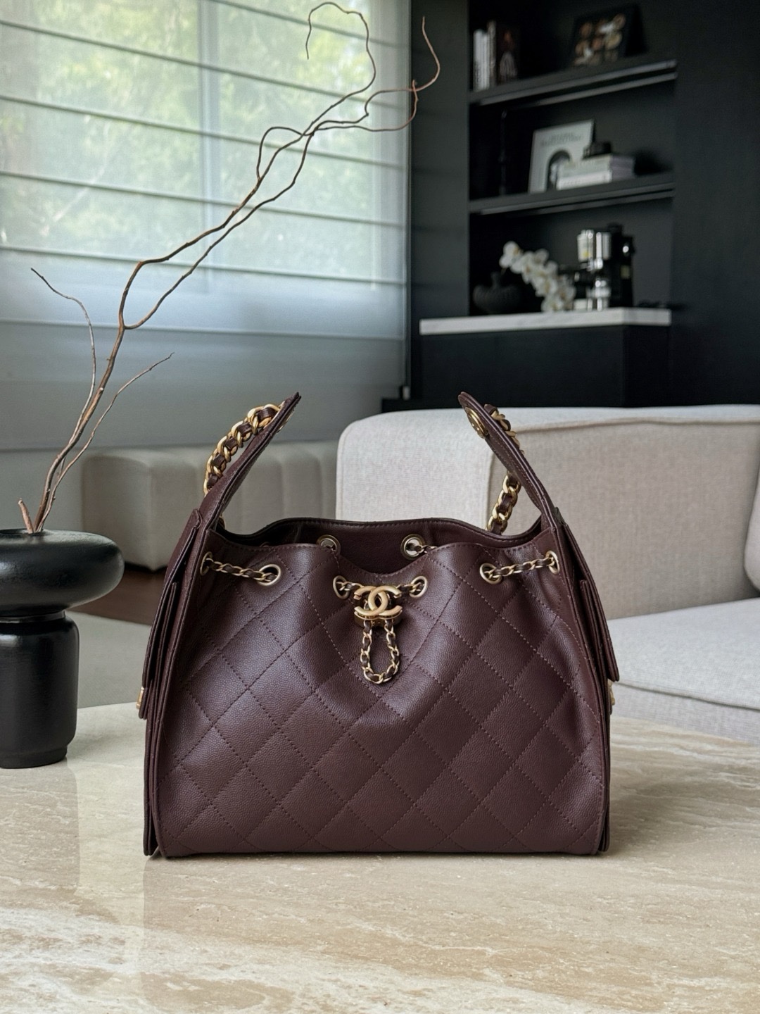 Chanel 25 small hobo bag in dark brown caviar leather with aged gold-tone hardware Size 30x26x14cm