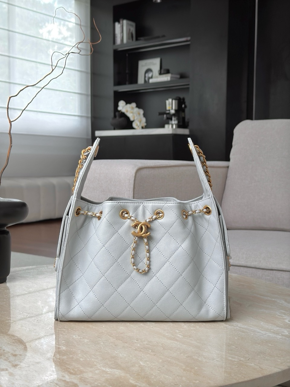 Chanel 25 small hobo bag in light blue caviar leather with aged gold hardwareSize 30x26x14cm