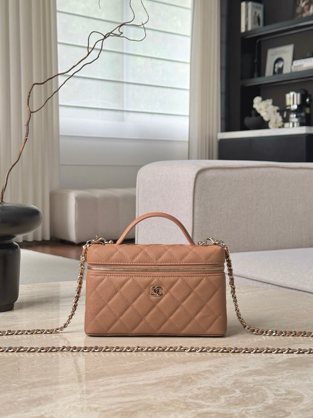 Chanel  Top Handle Slim Vanity with Chain in brown caviar leather.  19.5x17x5cm