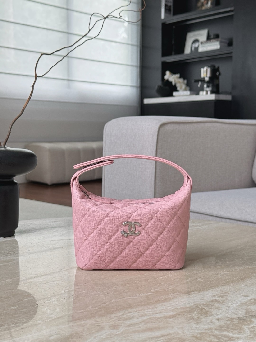 light pink Chanel hobo bag in a shiny grained calfskin with silver-tone metal hardware.  21.5x19x7.5cm