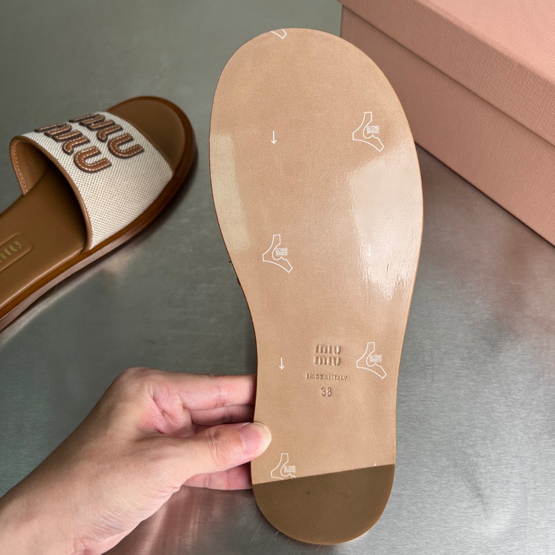 Miu Miu canvas and leather slides in beige/brandy