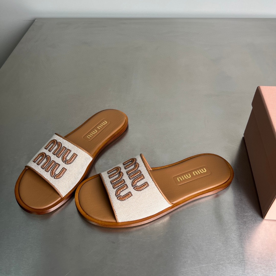 Miu Miu canvas and leather slides in beige/brandy