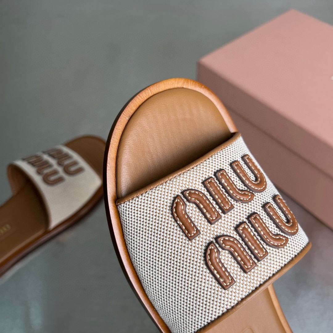 Miu Miu canvas and leather slides in beige/brandy