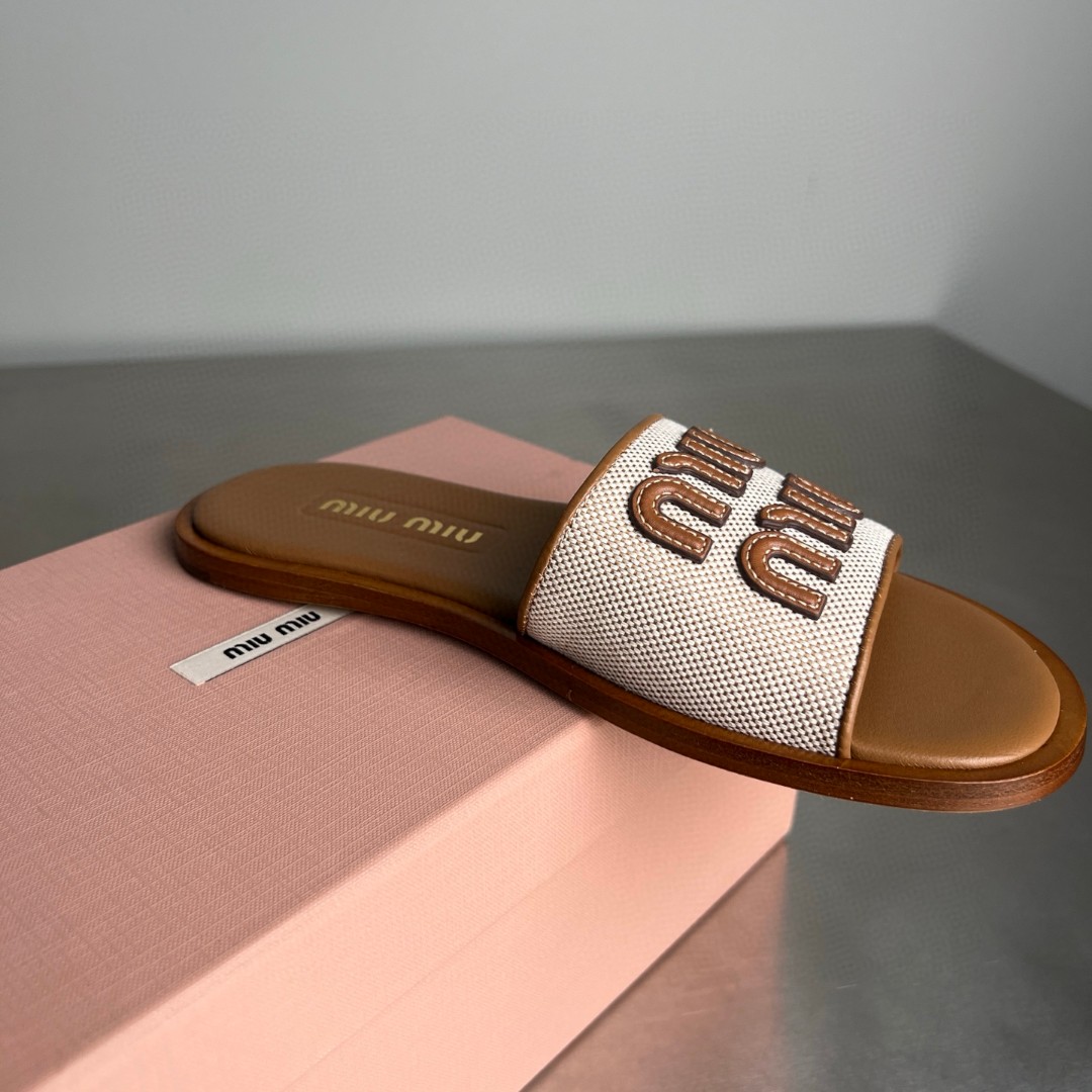 Miu Miu canvas and leather slides in beige/brandy