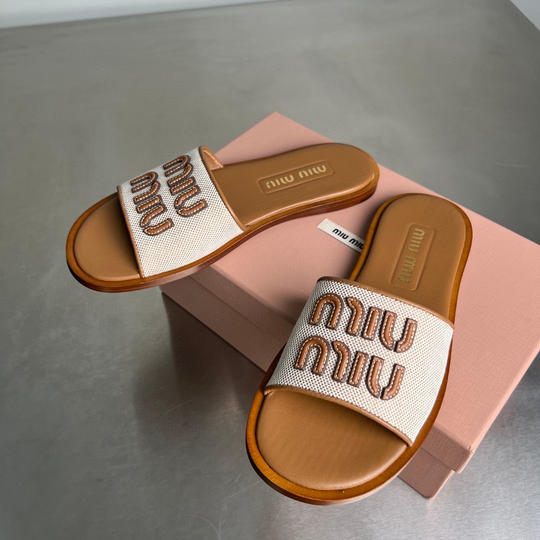 Miu Miu canvas and leather slides in beige/brandy