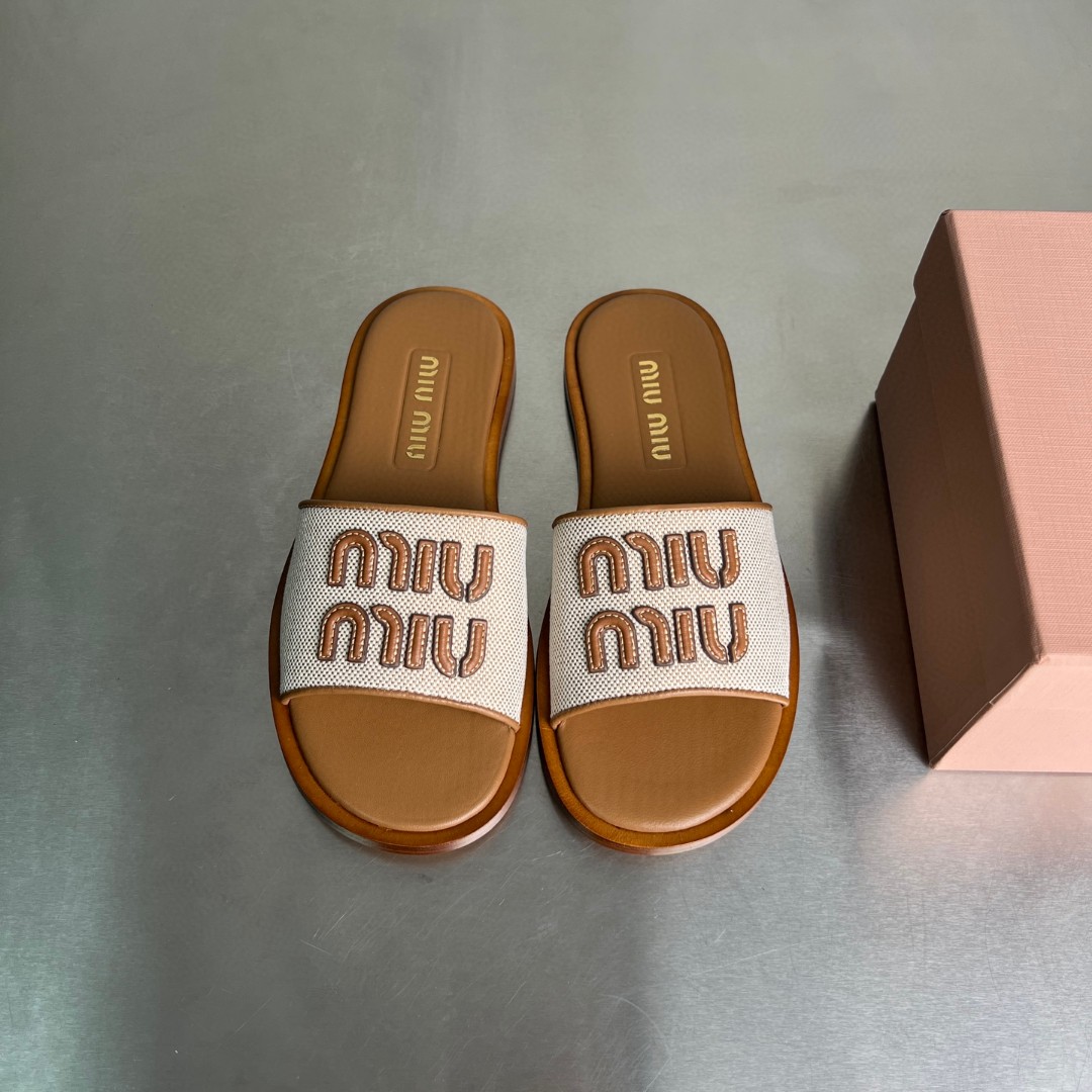 Miu Miu canvas and leather slides in beige/brandy