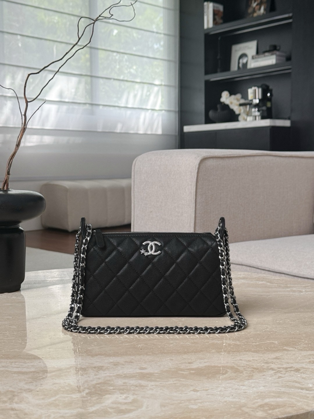 Chanel 25 small handbag in black grained calfskin with silver-tone metal hardware.  Size 21x14x5.5cm