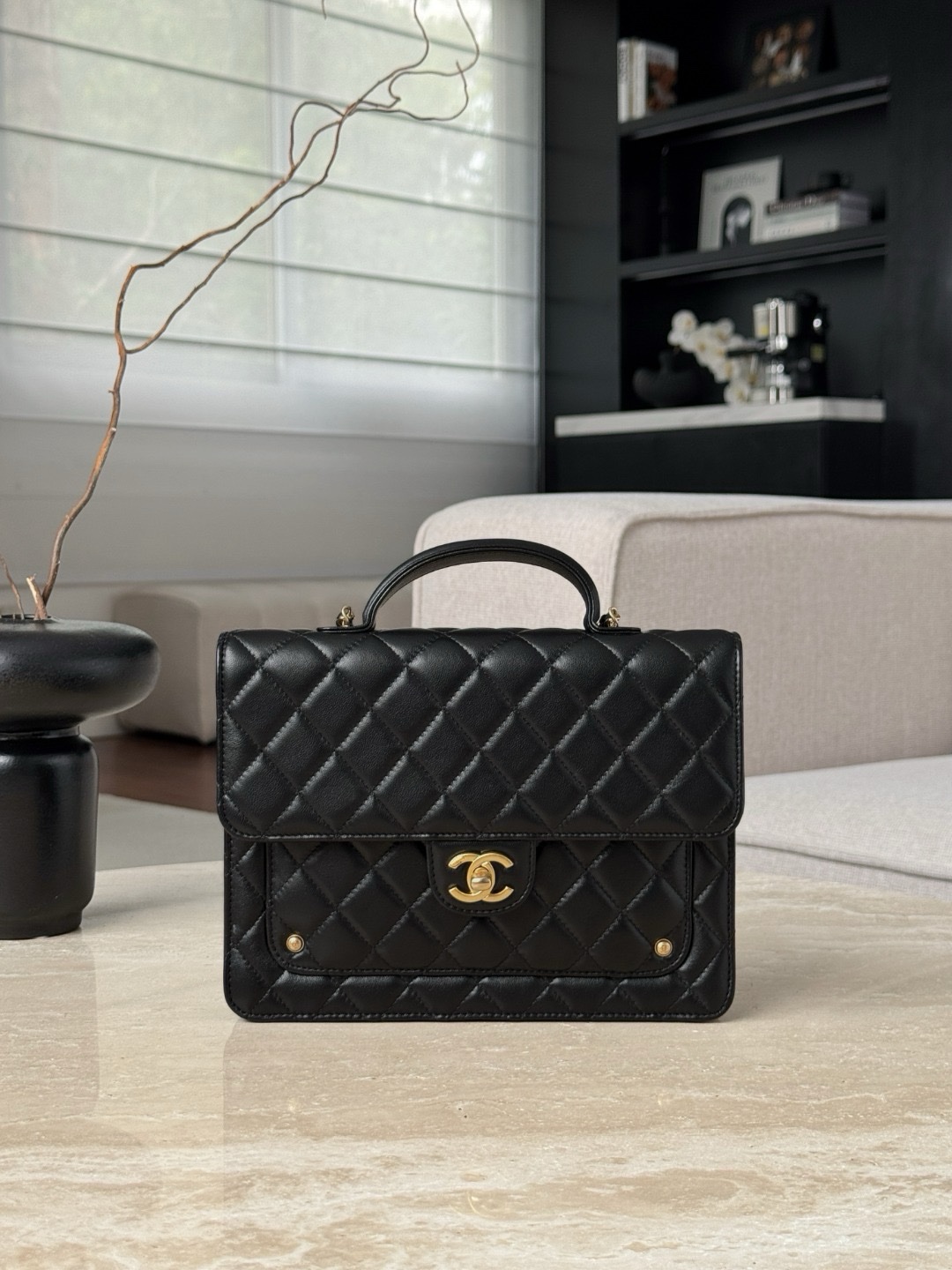 Chanel 25B Autumn/Winter Messenger Backpack in black with gold-tone hardware.  Size 18x23x6cm