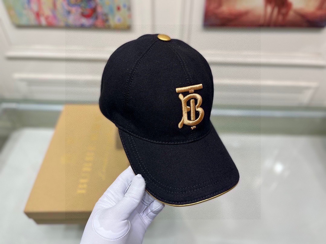 Burberry black cotton baseball cap with the gold-tone 'TB' monogram logo