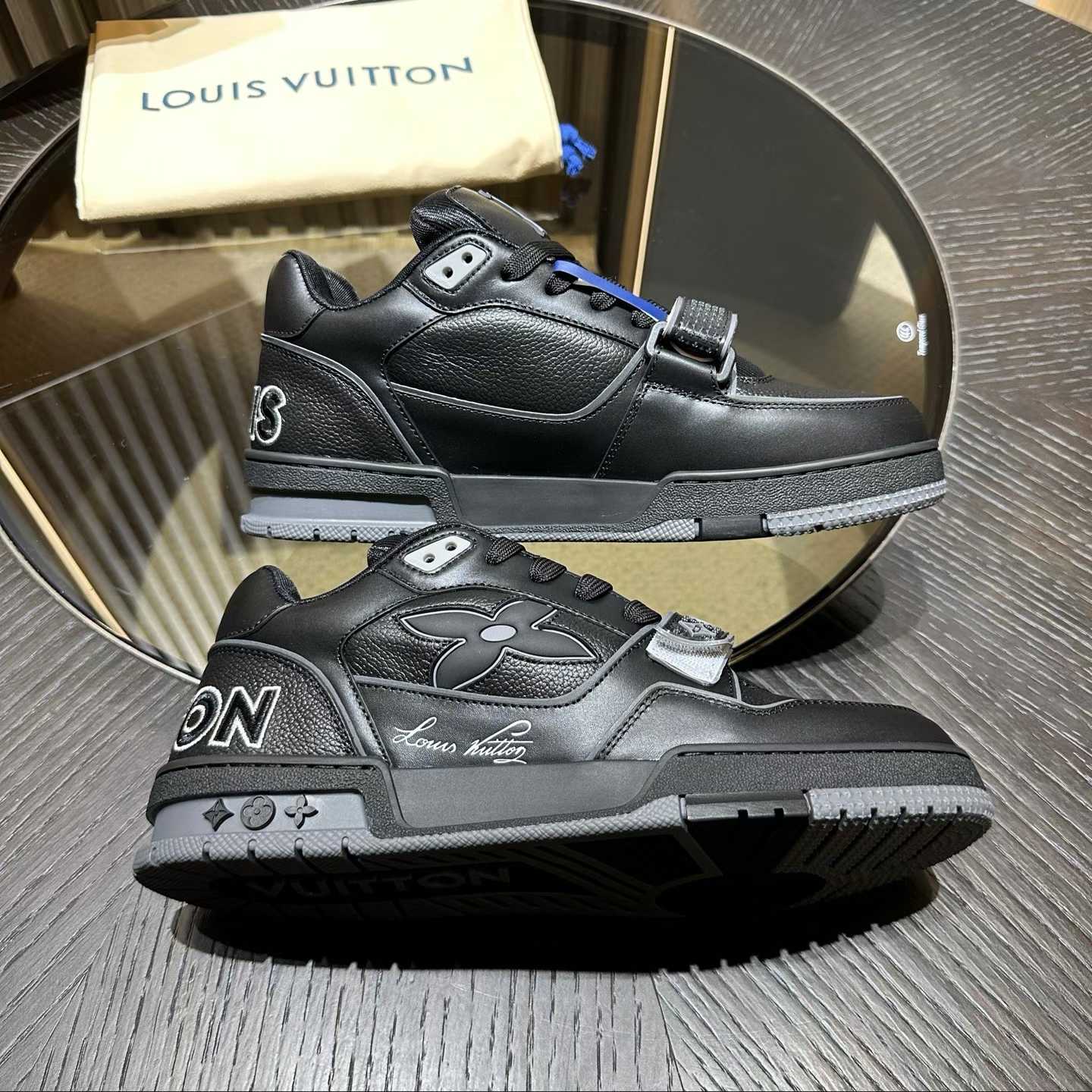 LV Trainer sneakers in black embossed Monogram leather