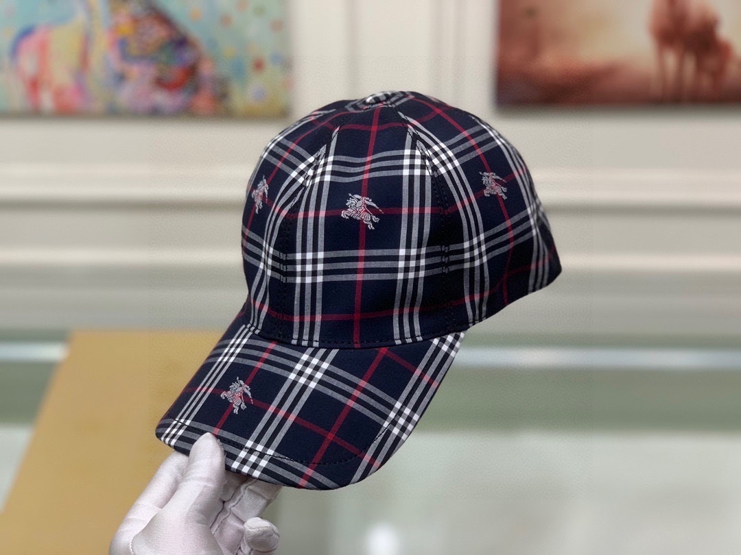 Burberry Check EKD baseball cap in a navy blue, red, and white check pattern, featuring the Equestrian Knight Design