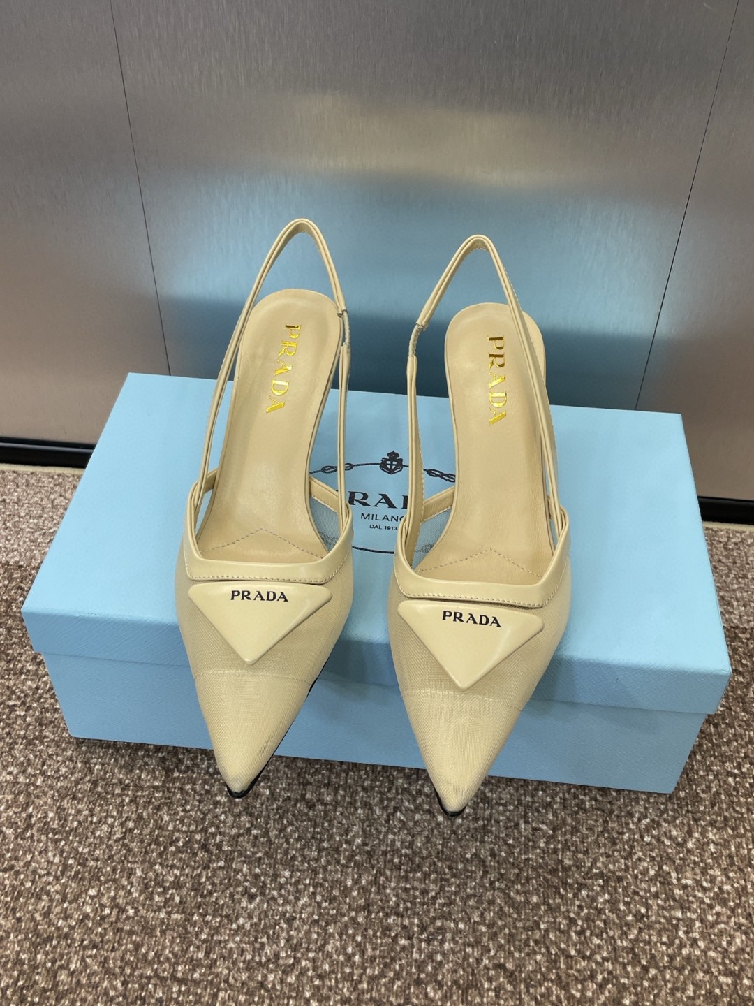 Prada mesh fabric slingback pump in a light beige or natural color with a 75mm varnished heel