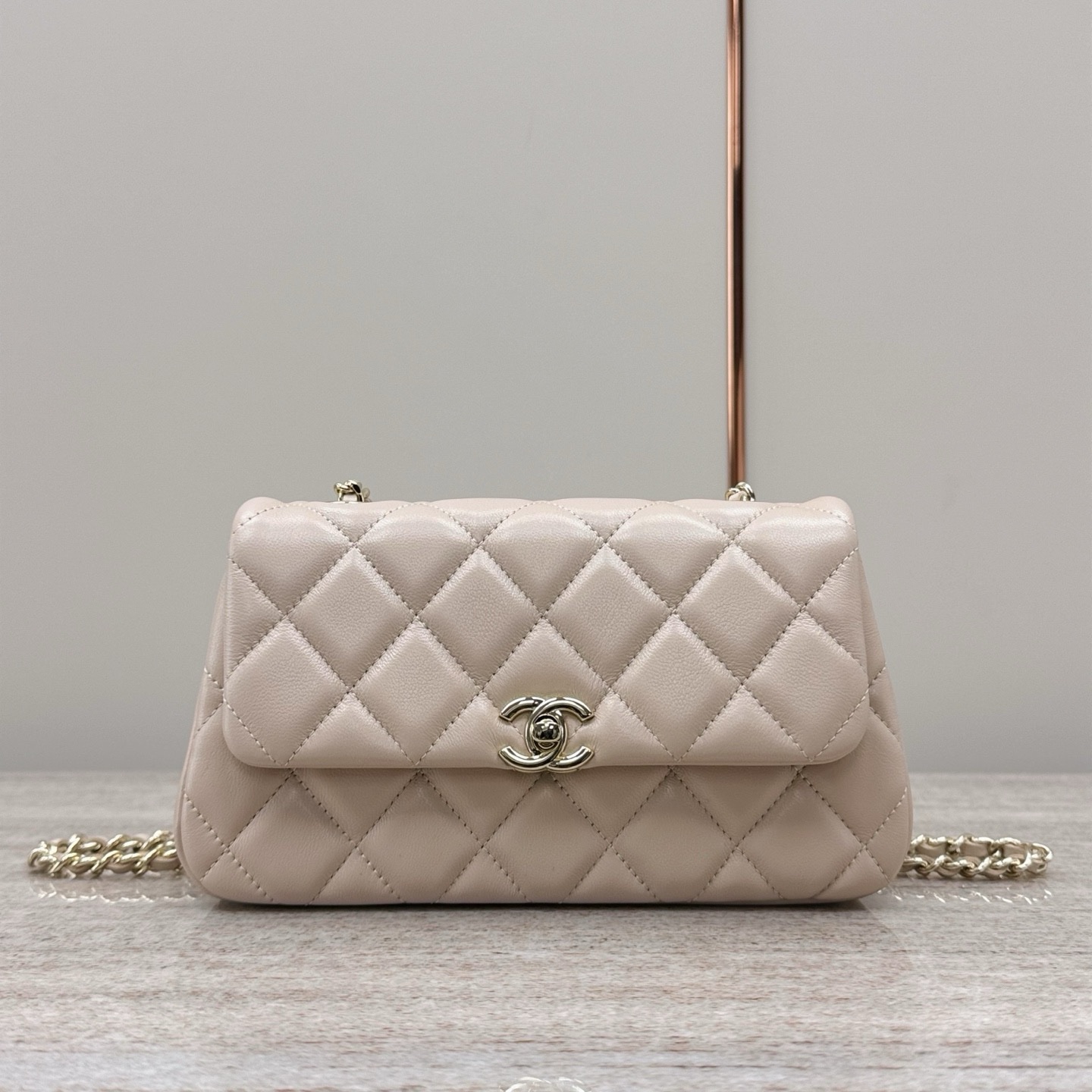 Chanel Bags Code 10325 25S mini flap bag in beige lambskin leather. Size 11x20x5.5cm